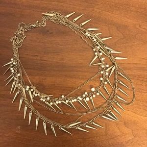 Gold colored necklace